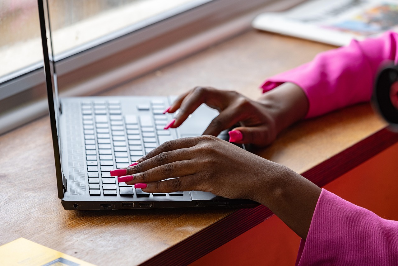 Laptop, typing, working — Learn how to check business performance with the help of tracking applications