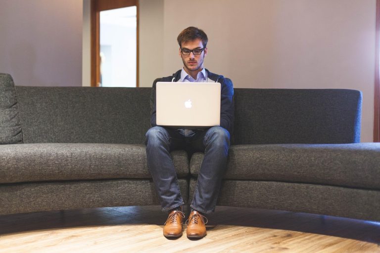 Man, laptop, businessman — Tips for choosing a cryptocurrency wallet