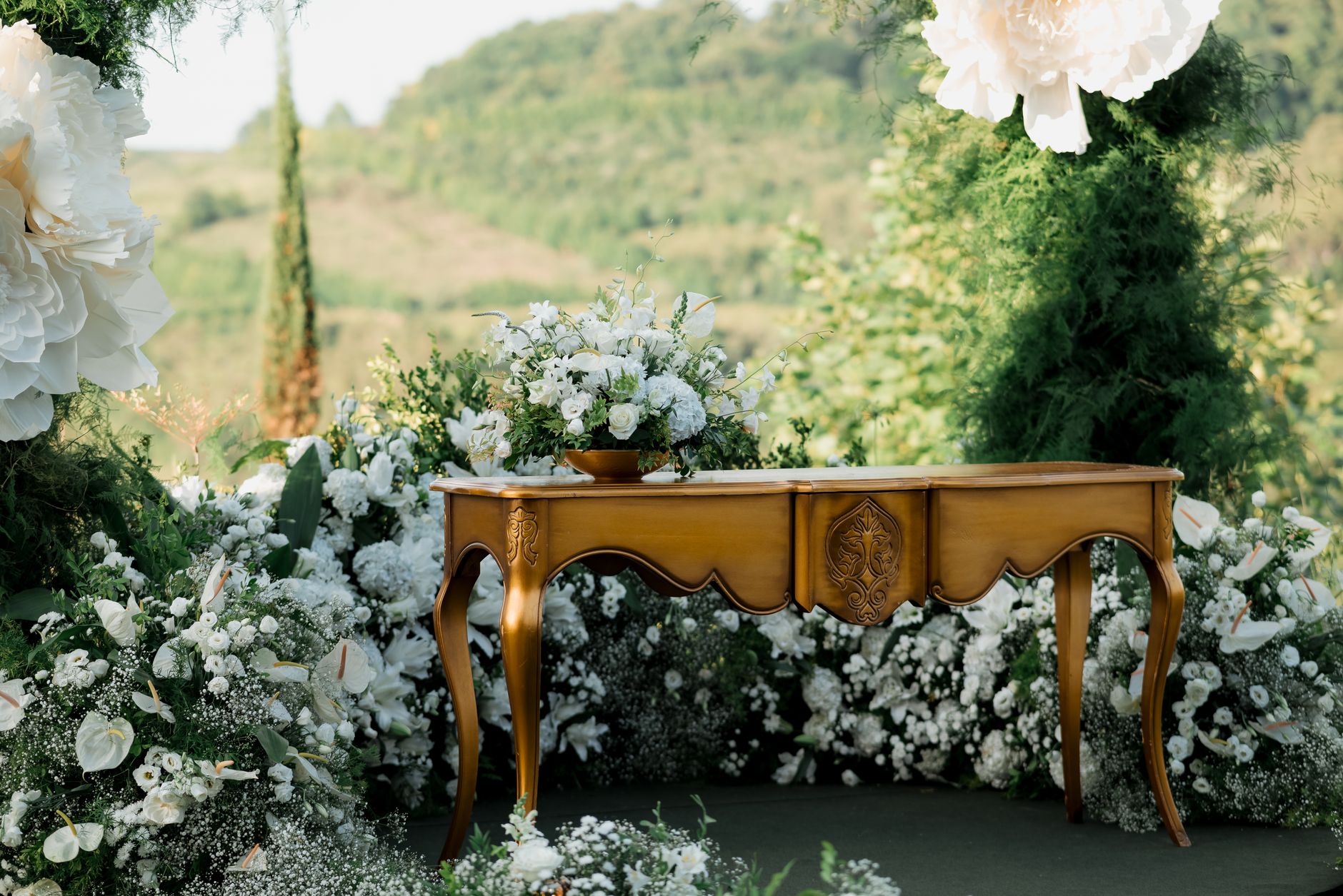 Charming outdoor wedding setup with elegant floral decor and vintage wooden table. — "Upgrade Doorways with Stylish Torus Arc