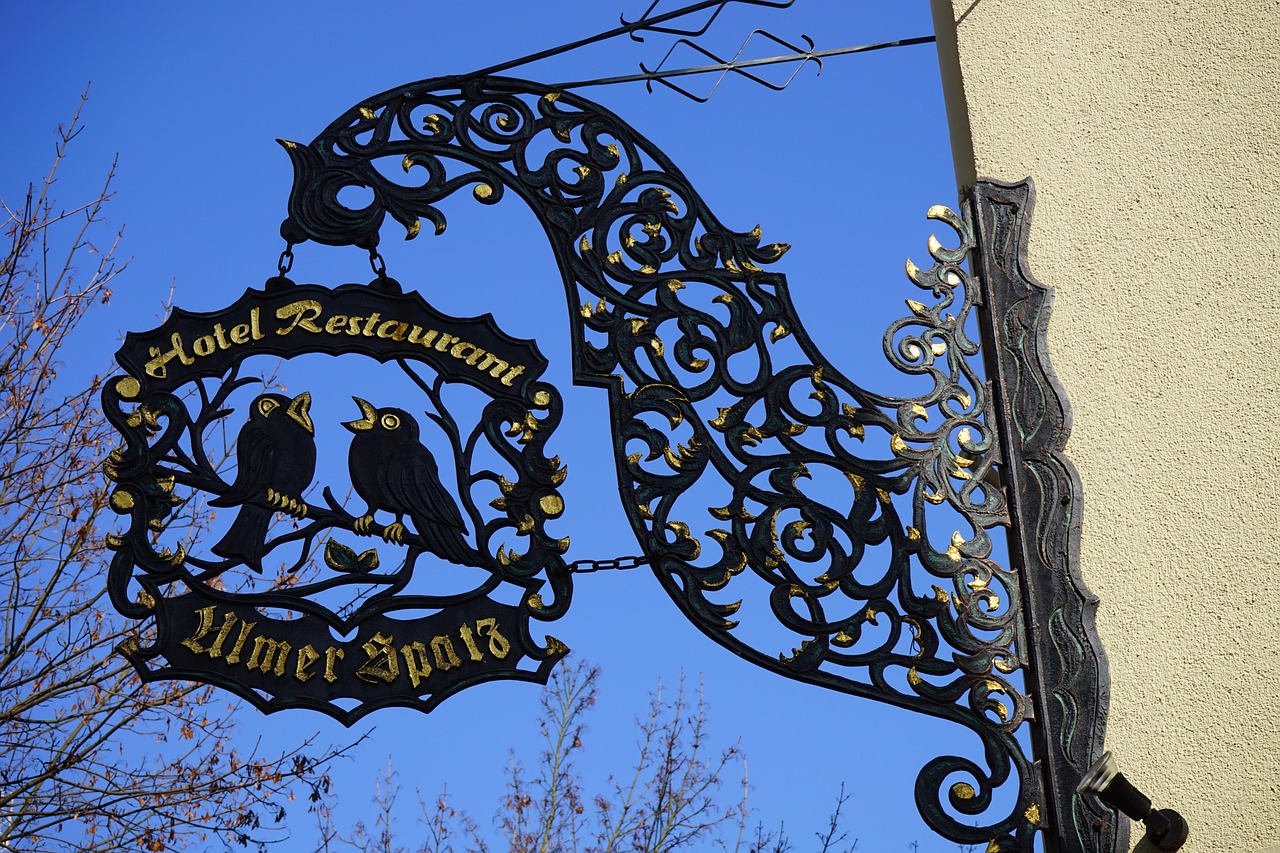 Nasal shield, inn sign, wrought ironwork — Weather-Resistant Commercial Tent Solutions